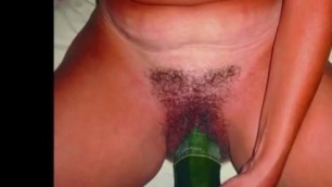 HAIRY MILF WITH BIG CUCUMBER