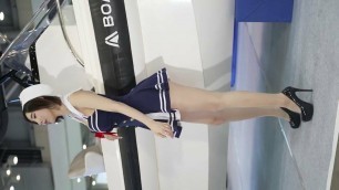 Korean short haired girl in cosplay, sailor in black high heels