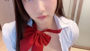 Famous Chinese Cosplayer XiaoYouNai å°å°¤å¥ schoolgirl shows tits and masturbates with a dildo